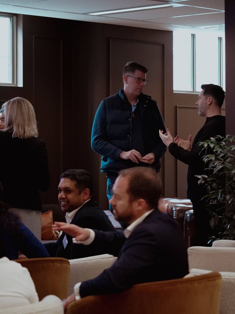 Leaders in discussion during a briefing
